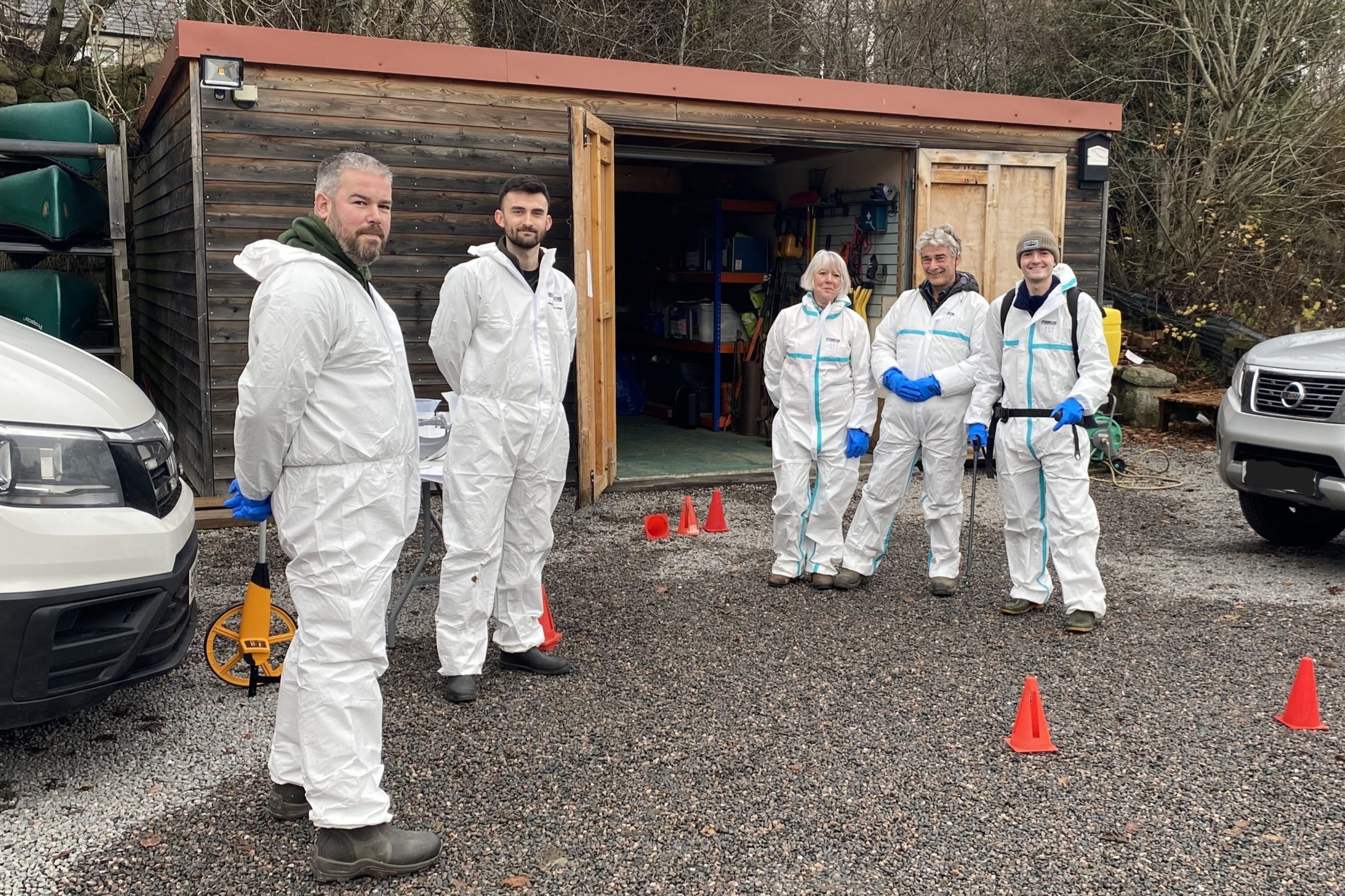 A group of volunteers in protective clothing ready for training