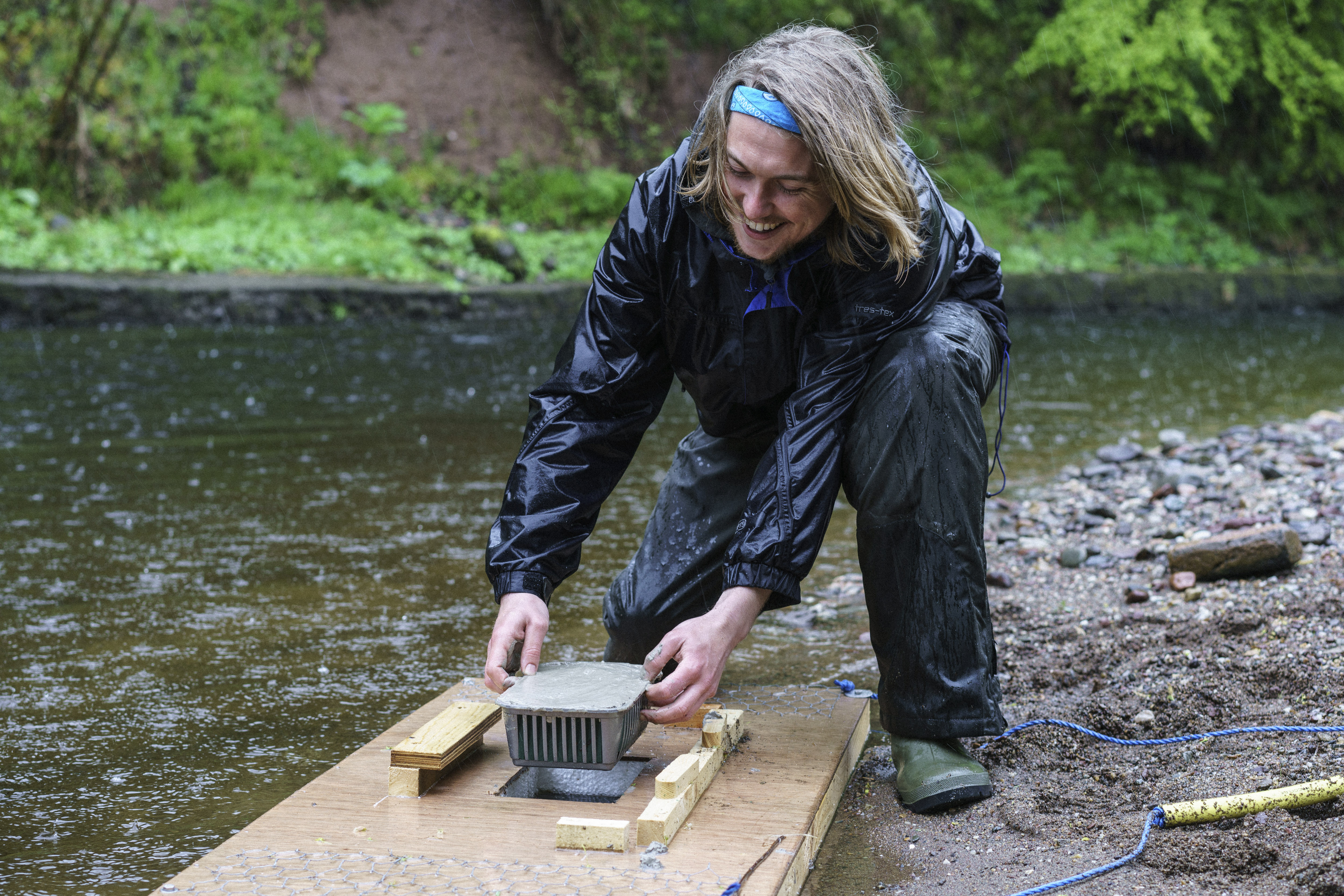 Volunteer setting up mink raft